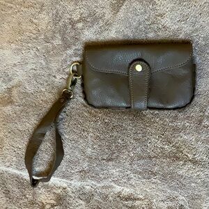 VERY NICE LEATHER HAND MINI BAG. A Western look.